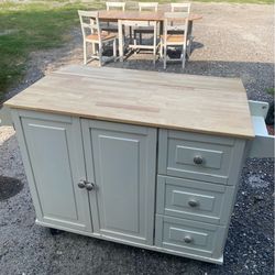 Folding table, chairs and island
