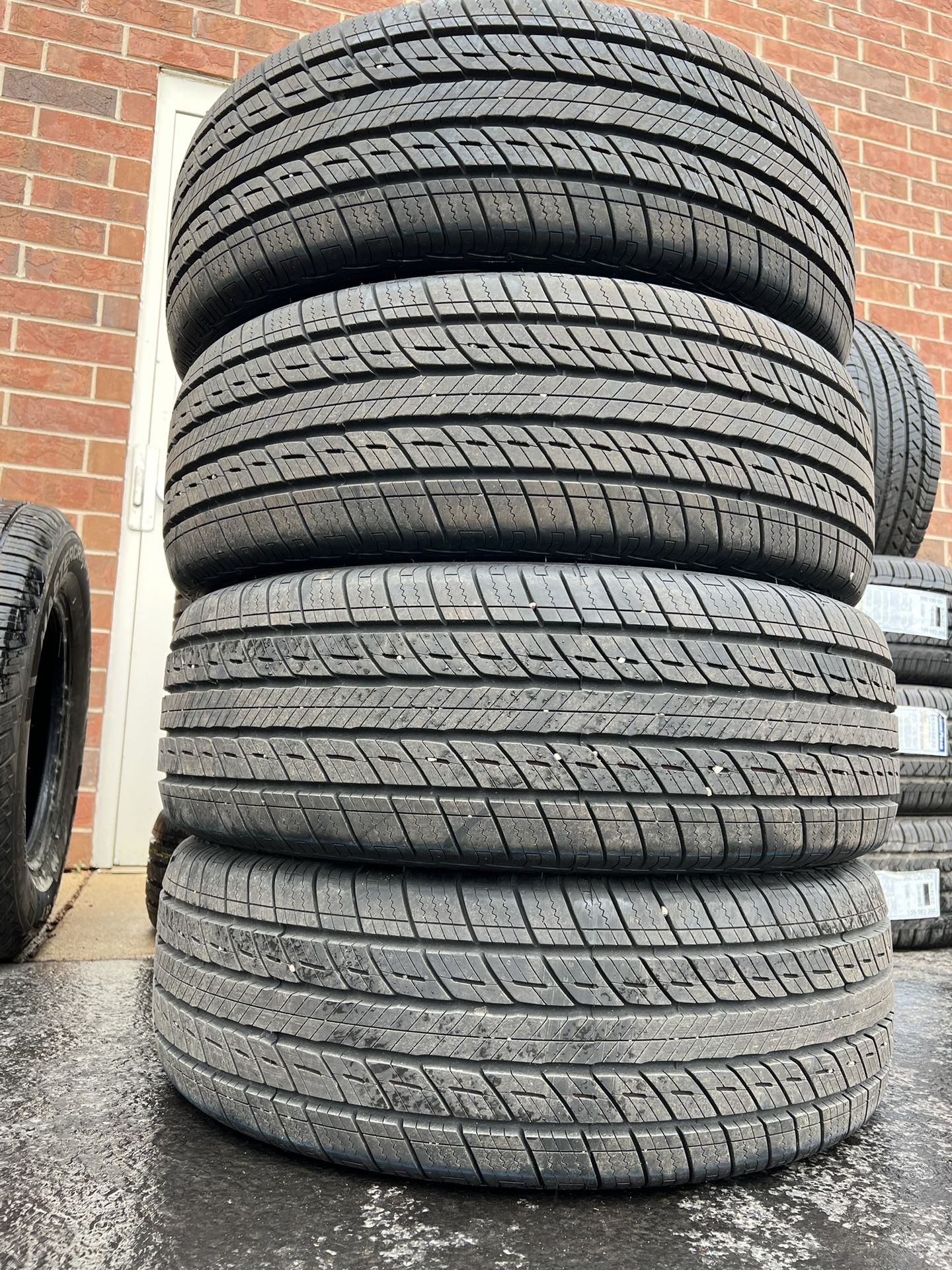 Four 235/55R20 Uniroyal Tiger Paw