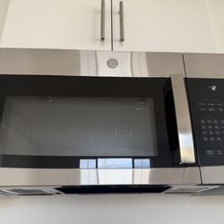 Brand New GE Over the range Microwave