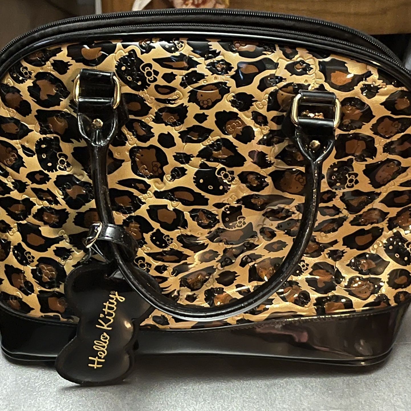 LOUNGEFLY HELLO KITTY Large Domed Weekend Bag Leopard Embossed Patent  Leather for Sale in San Pedro, CA - OfferUp