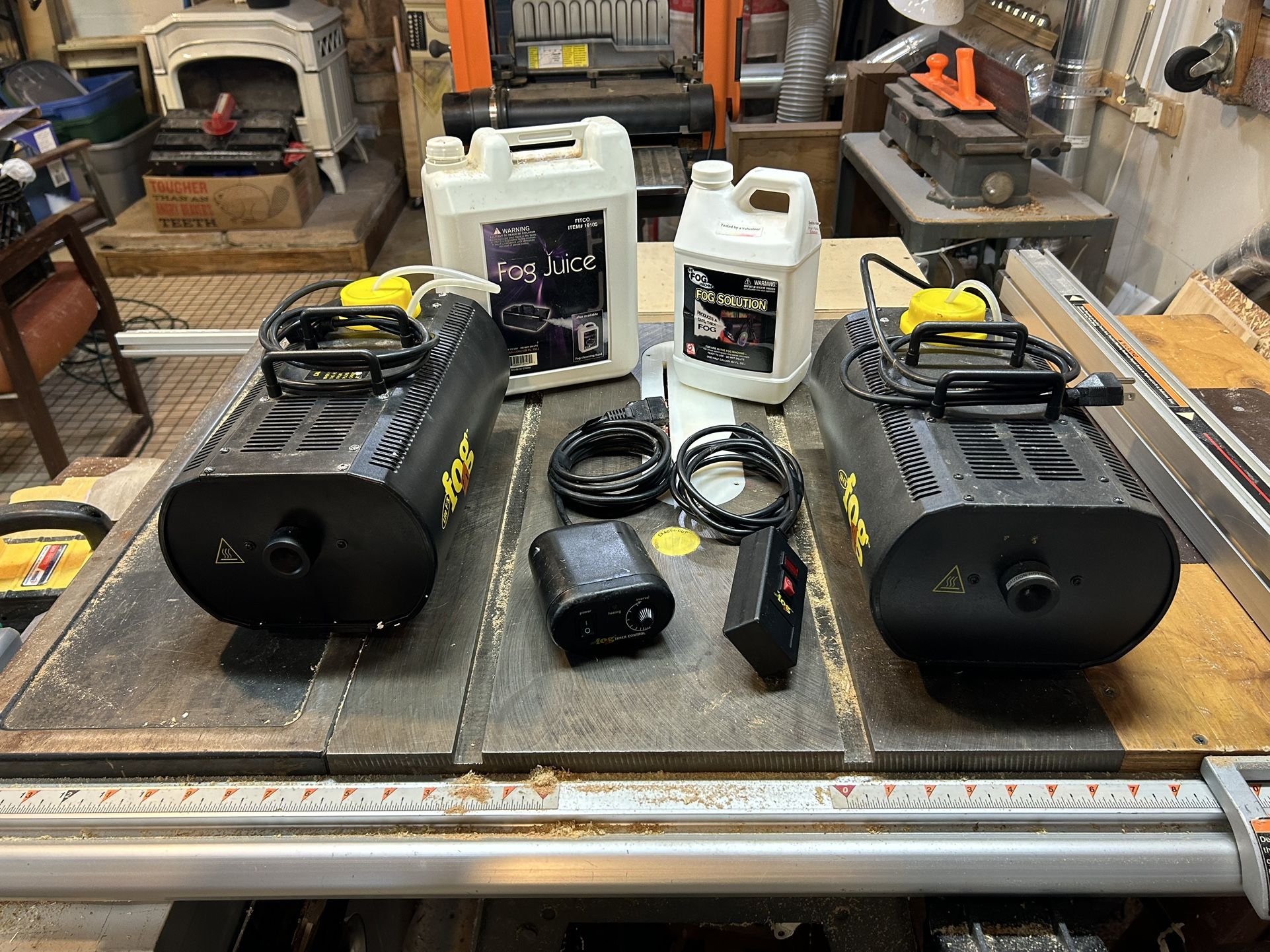 2 Fog Machines, 2 Controllers, 2 Partial Jugs Of Fog Juice