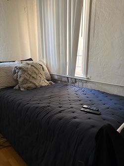 MOVING SALE twin bed with bed frame and comforter included !