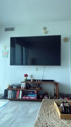 75” LG 4K Smart TV + Full Motion Articulating Wall Mount – $550