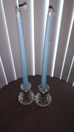 Candlestick holders with candles.
