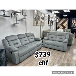 Dark gray manual reclining sofa and loveseat set 