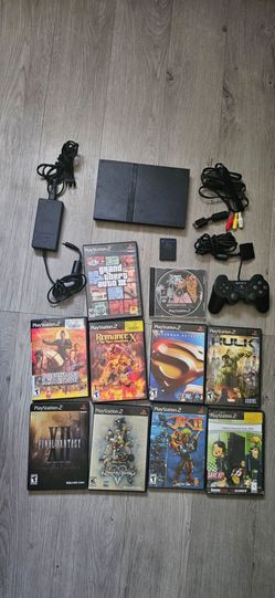 Playstation 2 slim with 10 Playable games