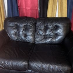 Black leather sofas