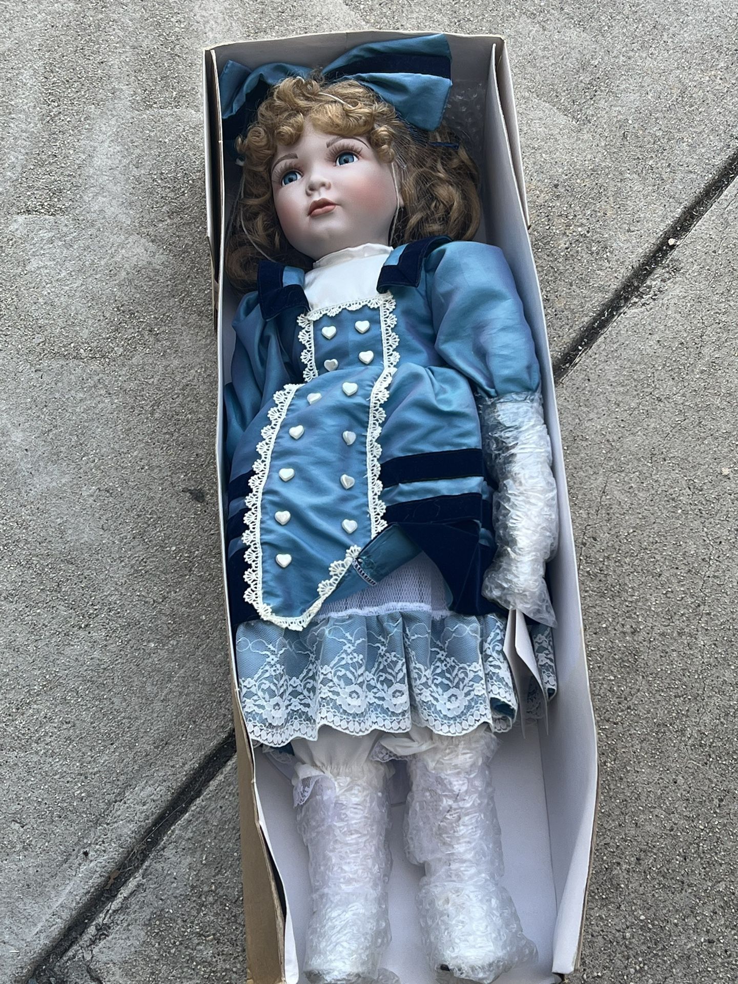 Porcelain Doll in Blue Dress