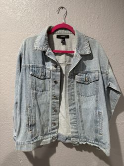 forever 21 Light blue denim jacket with a relaxed fit