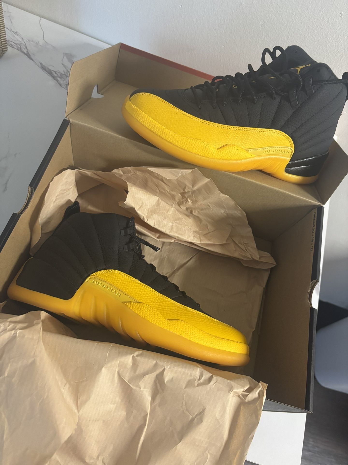 Air Jordan 12s University Gold