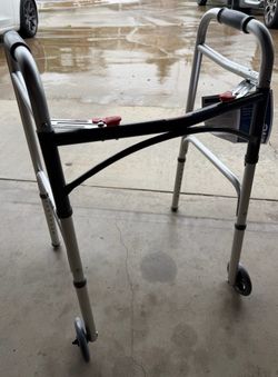Folding walker with wheels