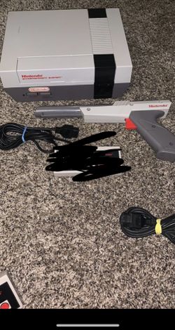 Nintendo with arcade control, game case, 4 score gun and 2 games