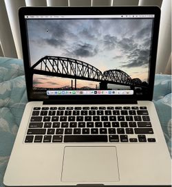 Apple MacBook Pro 13” - macOS 15.8 Sequoia