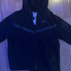 Never worn Nike Tech