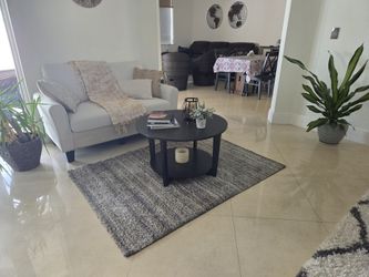 Round Black Coffee Table with Shelf – $80