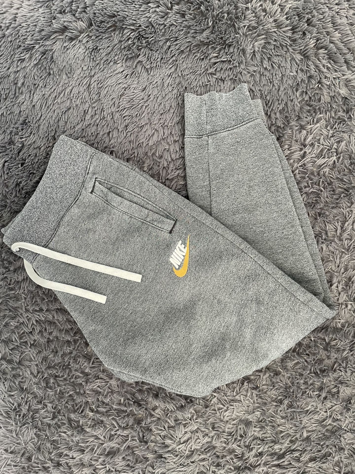Nike grey jogger sweatpants with yellow swoosh | men medium