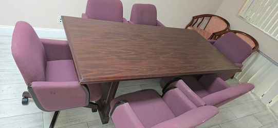 Conference Table with 6 Chairs in good condition.