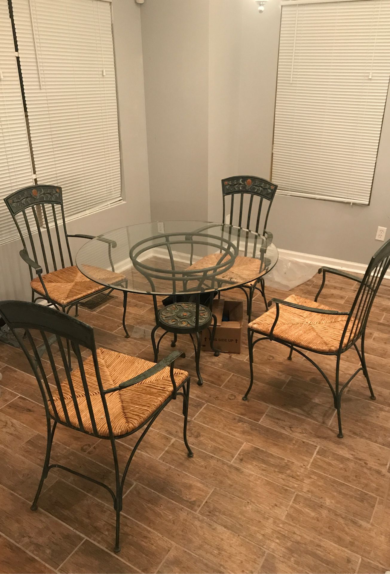 Dining set with glass tabletop, base, and four chairs | $200 OBO