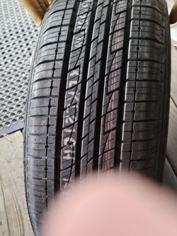 New TIRE AND RIM.