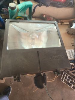 Acculite commercial flood light. Brand new with buble.