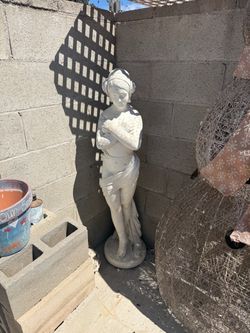 Antique white women statue