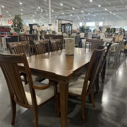 9 Pieces Dining Set / Includes: Table and 8 chairs. 