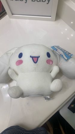 Hello kitty cinnamon roll character coin bank