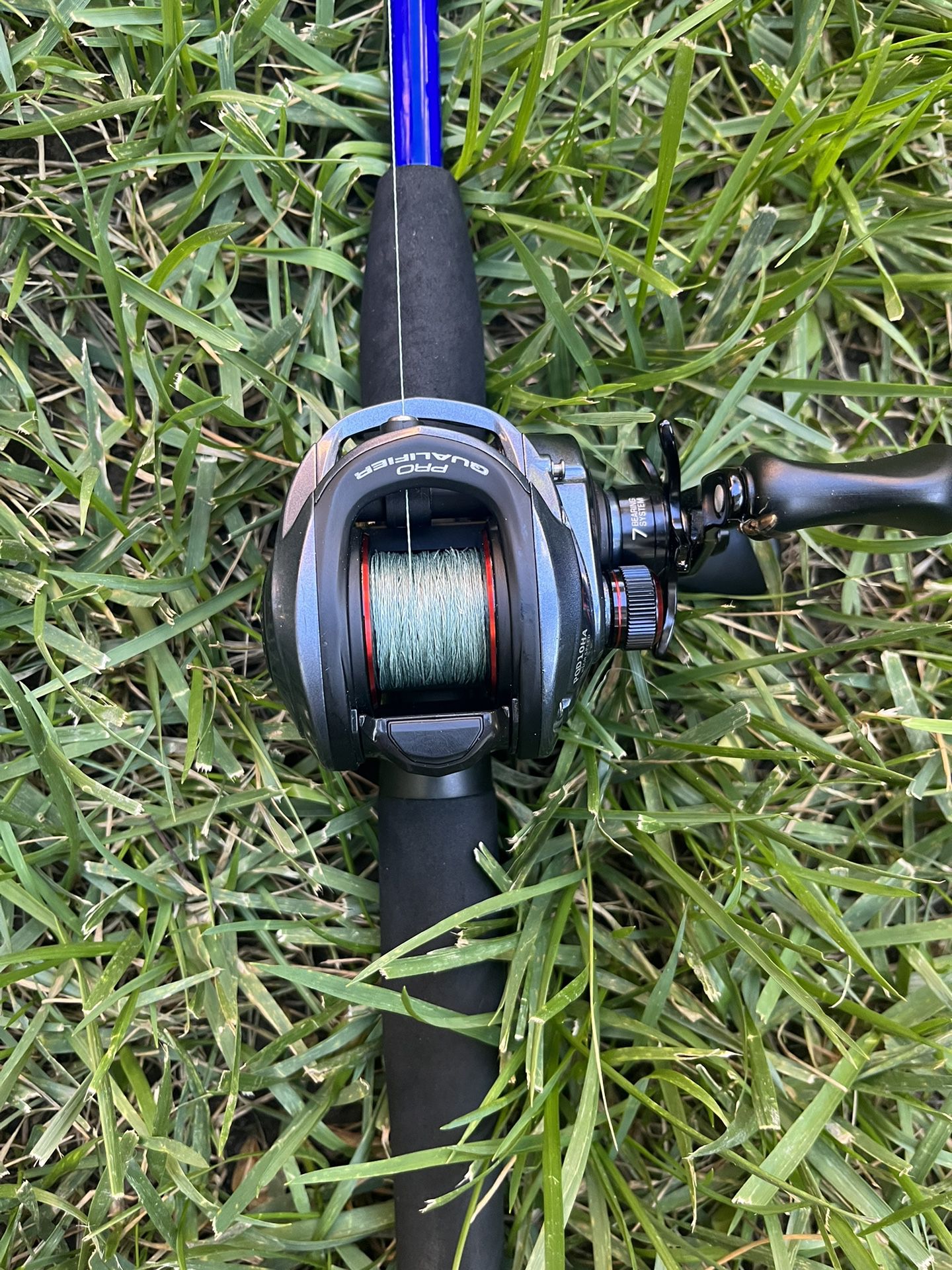 Barley Used Pro Qualifier Reel With 15 Pound Braid