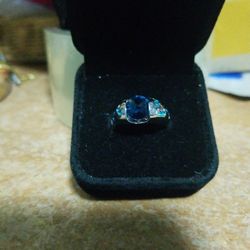 Size 6 Lake Blue Topaz Ring With Butterflies On The Side Sterling
