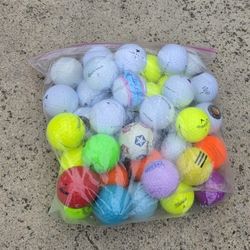 Mixed Used And Unused Golf Balls