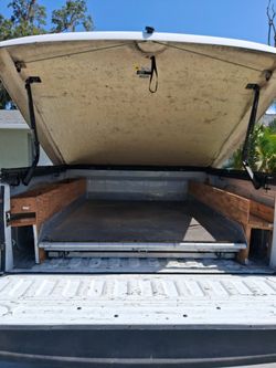 Sliding truck bed, decked drawer system