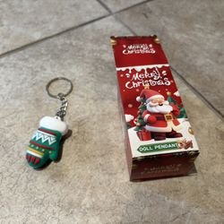 Merry Christmas doll pendant. Open box