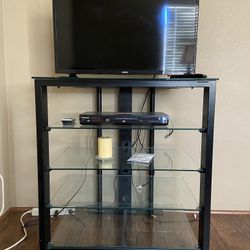 TV, TV stand, and DVD Player