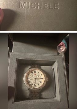 Michele wristwatch featuring a diamond-style bezel