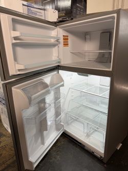 Refrigerator, whirlpool 33” wide top freezer refrigerator with 1 year warranty