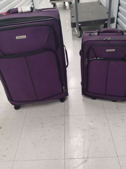 Two purple luggage