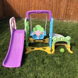 Toddler play structure climber and a swing set
