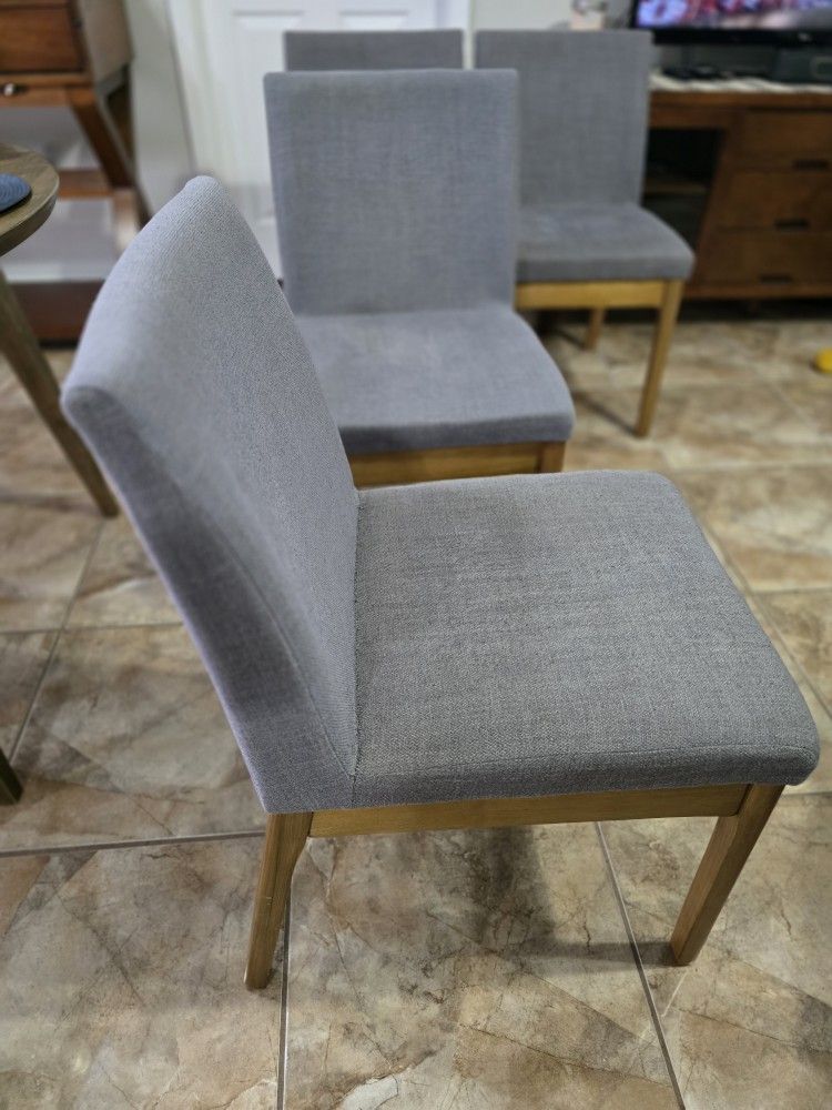 4 Mid Century Dining Chairs - Asking $90 or best offer.