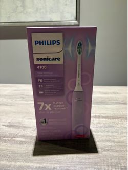 New Philips Sonicare 4100 electric toothbrush in purple