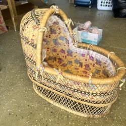 small wicker doll bassinet