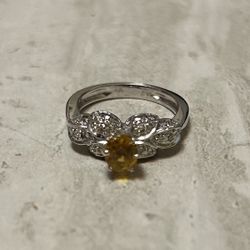 18kt White Gold .60 CT Yellow Sapphire And Diamond Ring