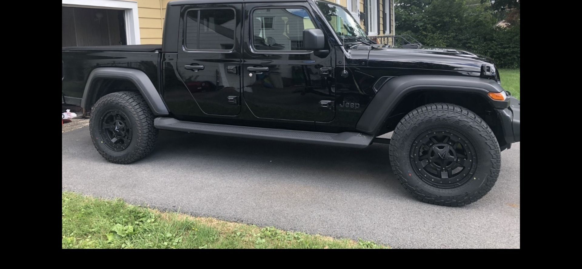 4 XD Rockstar 2 rims and Faulkan wild peak a/t3w 275 70/18 tires.