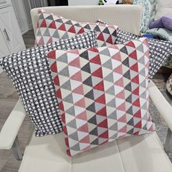 4 New, never used, indoor or outdoor pillows.