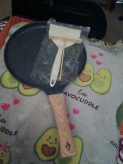 This is a non-stick flat crepe pan and griddle, also known as a dosa tawa,