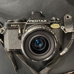 Vintage Pentax Mv1 35mm Camera With Lens