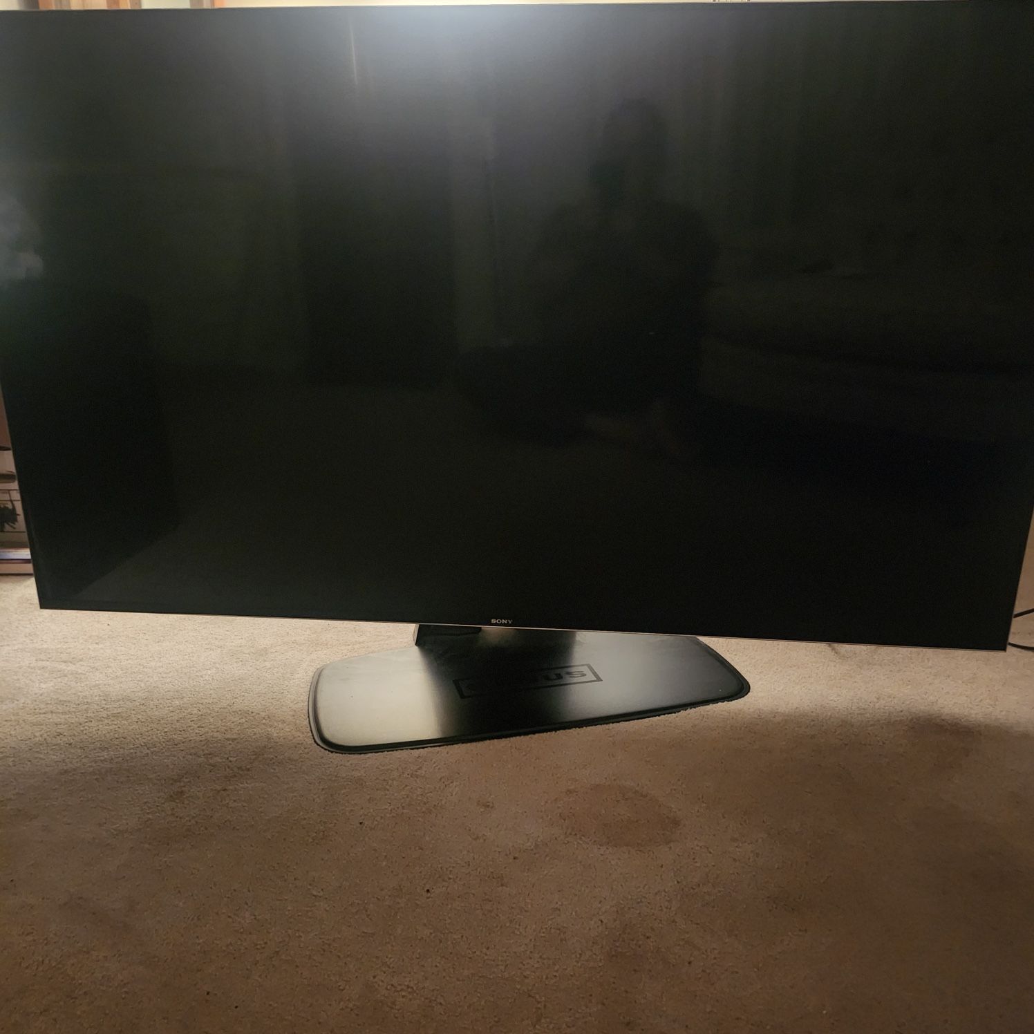 Sony Bravia 65” Smart TV – Model # SBR-65X900H plus Sanus TV base.