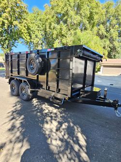 DUMP TRAILER 14X8X2 HEAVY DUTY 8 LUGS,SET RAMPS, ROLLING TARP, SPARE TIRE,SCISSOR HOIST 7 TON,TOOL BOX FOR ANY QUESTION TEXT ME PLEASE HABLO ESPAÑOL