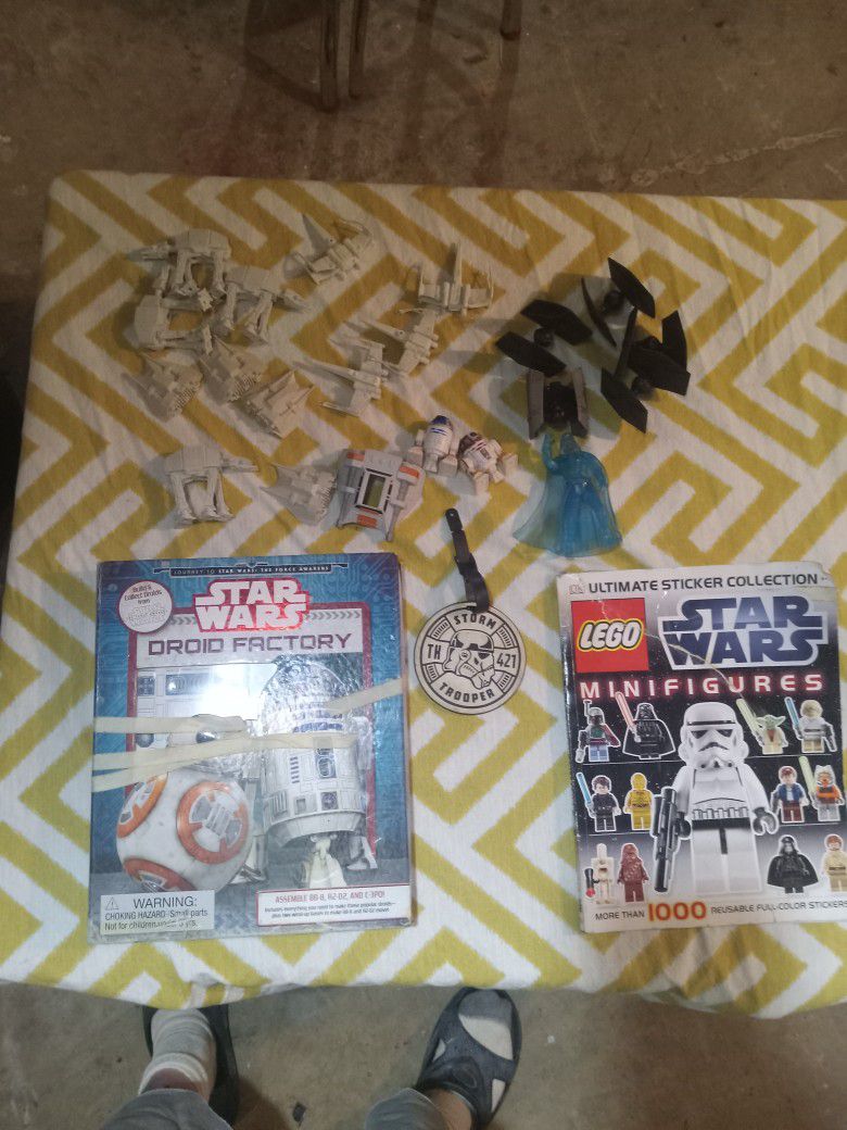 Star Wars Bundle. Includes 
Droid Factory (Unused), Lego Ultimate Sticker Collection (Unused), Storm Trooper Badge,  21 Figures.