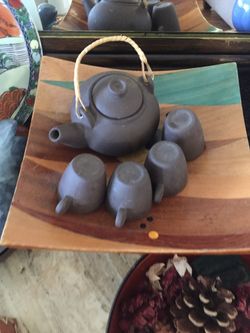 Tea pot and 4 small cups ceramics
