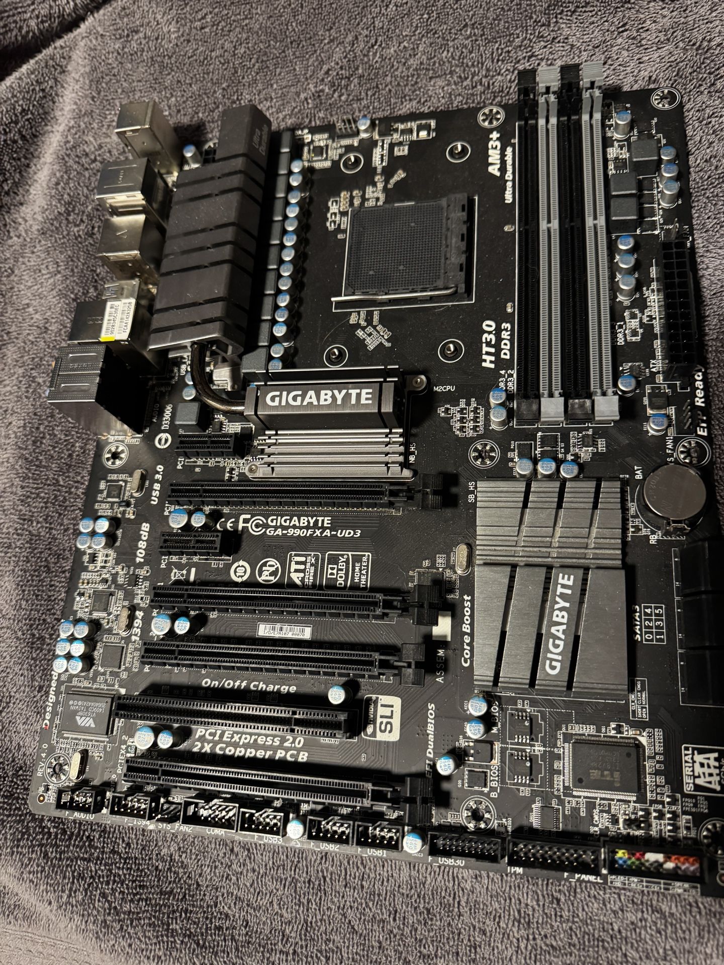Gigabyte GA-990FXA-UD3 series ATX motherboard (used $40 obo)